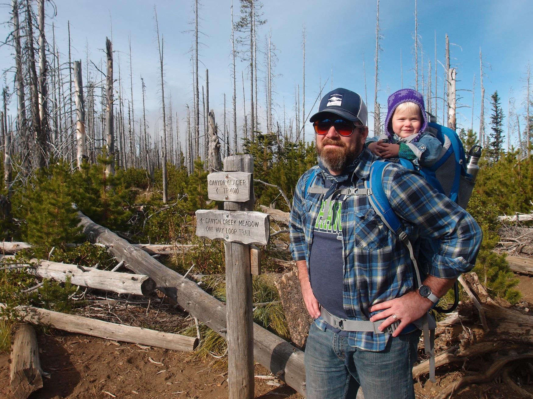 This is a father and daughter at the trailhead of the Canyon Creek Meadow Hike near Cold Springs Resort in Camp Sherman, Oregon