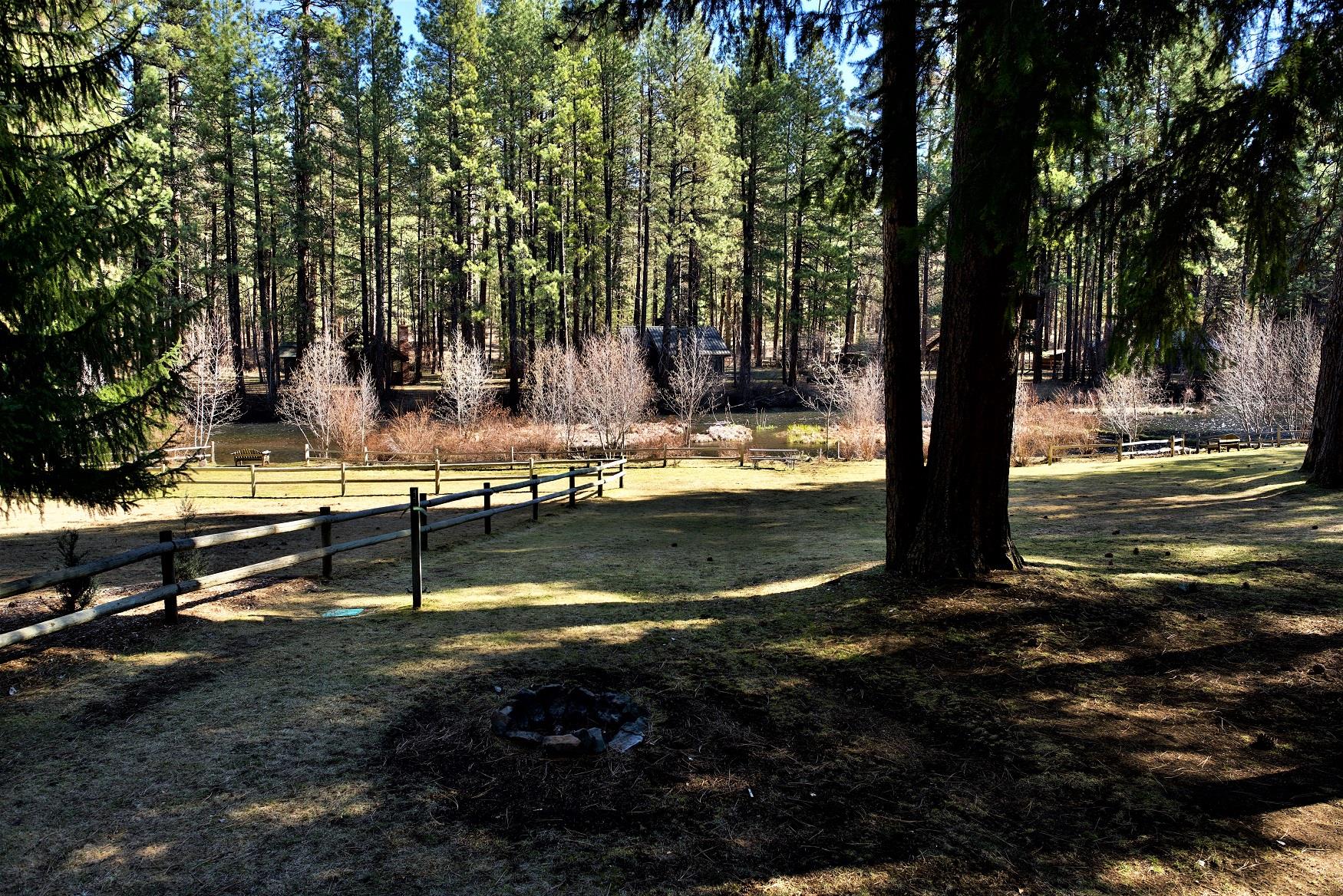 A perfect view of the Metolius River, off the deck of Riverview Cabin, at Cold Springs Resort in Camp Sherman, Oregon