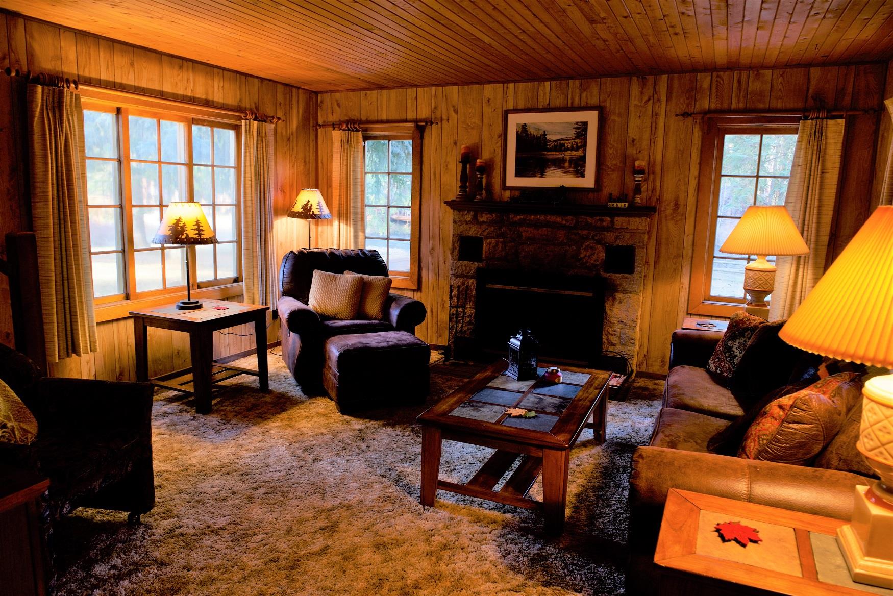 The cozy living room of Haberman Cabin at Cold Springs Resort & RV Park in Camp Sherman, Oregon
