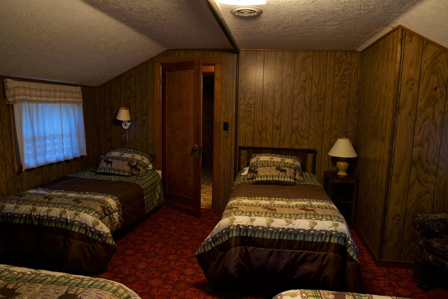 The kids will sleep tight tonight in the cozy upstairs sleeping area of Haberman Cabin at Cold Springs Resort, in Camp Sherman, Oregon