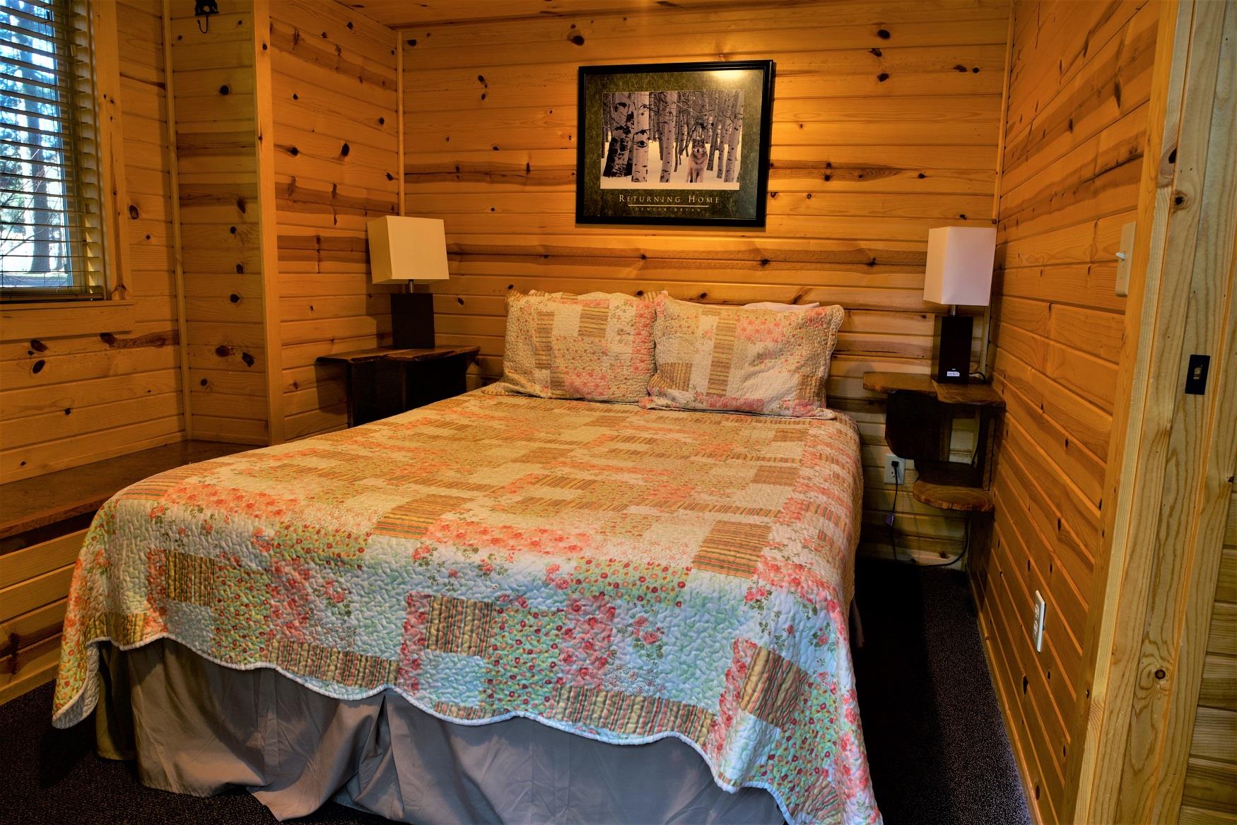 Get your best night sleep in the comfy queen bed in Ponderosa Cabin, at Cold Springs Resort & RV Park in Camp Sherman, Oregon