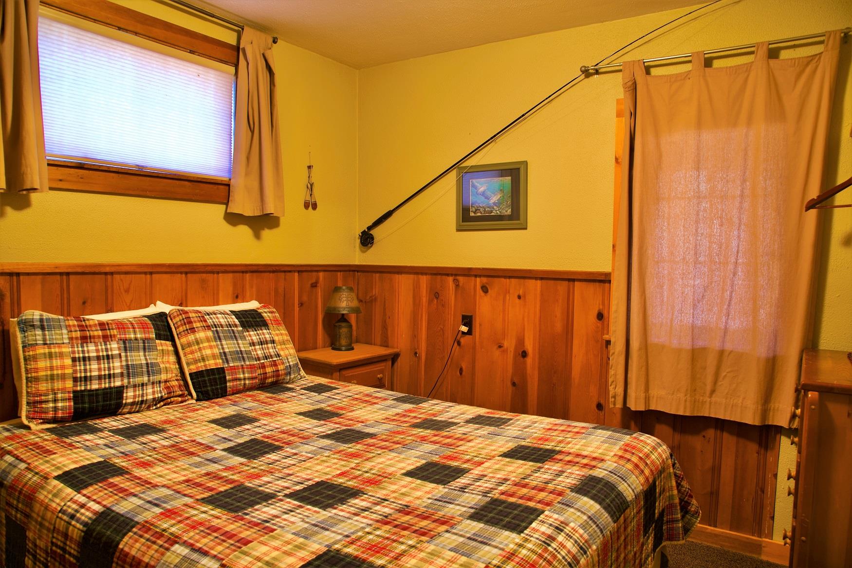 Get your best night sleep in the comfy queen bed in Log Cabin, at Cold Springs Resort & RV Park in Camp Sherman, Oregon