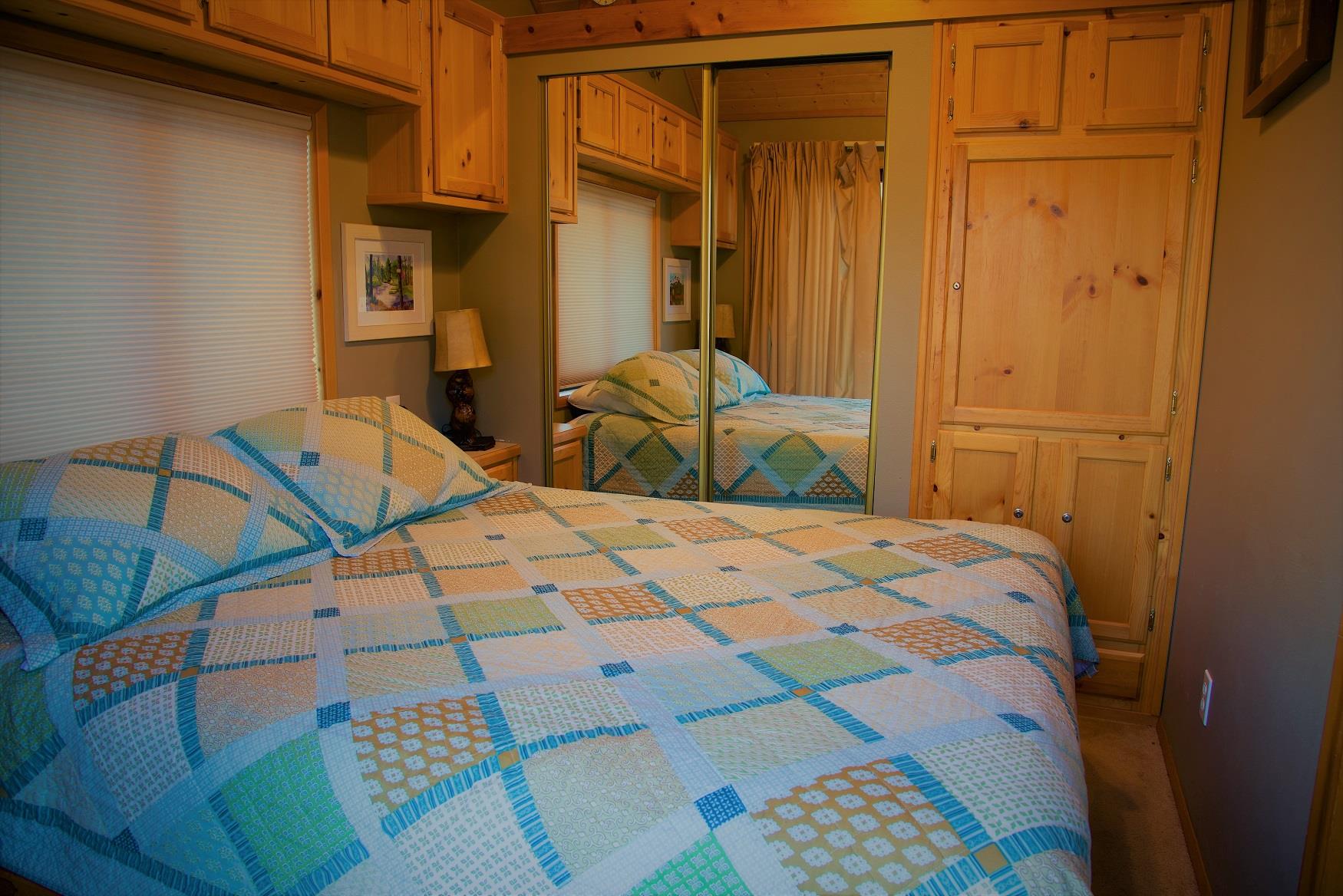 Get your best night sleep in the comfy queen bed in Maple Cabin, at Cold Springs Resort & RV Park in Camp Sherman, Oregon