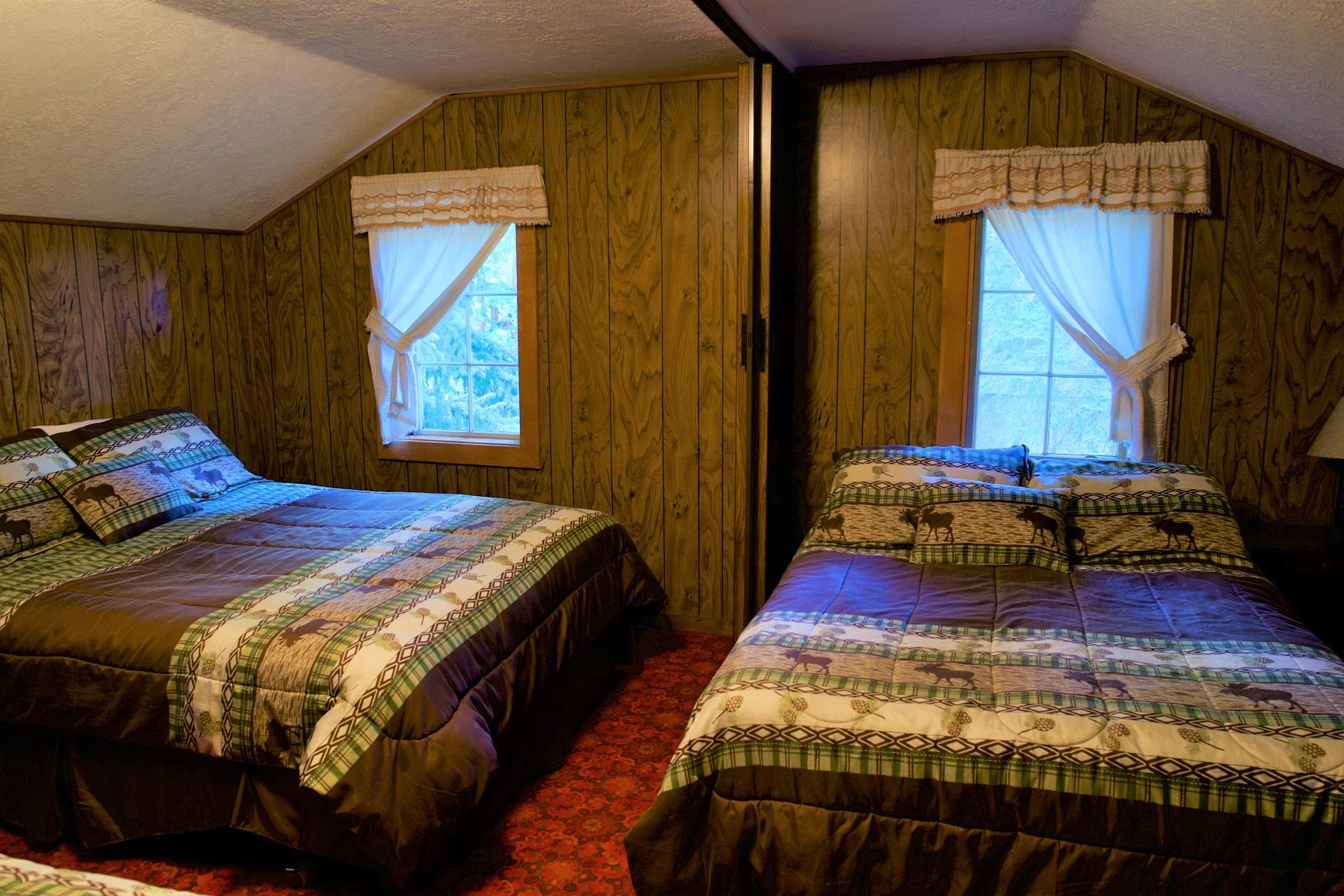 The kids will sleep tight tonight in the cozy upstairs sleeping area of Haberman Cabin at Cold Springs Resort, in Camp Sherman, Oregon