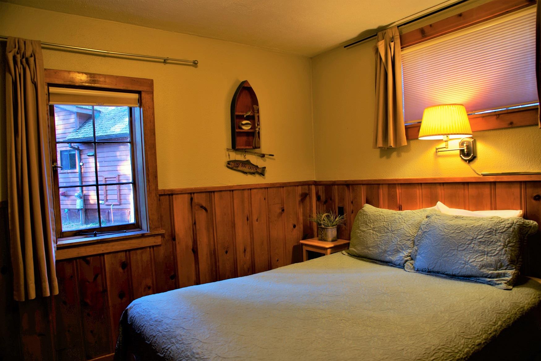 Get your best night sleep in the comfy queen bed in Log Cabin, at Cold Springs Resort & RV Park in Camp Sherman, Oregon