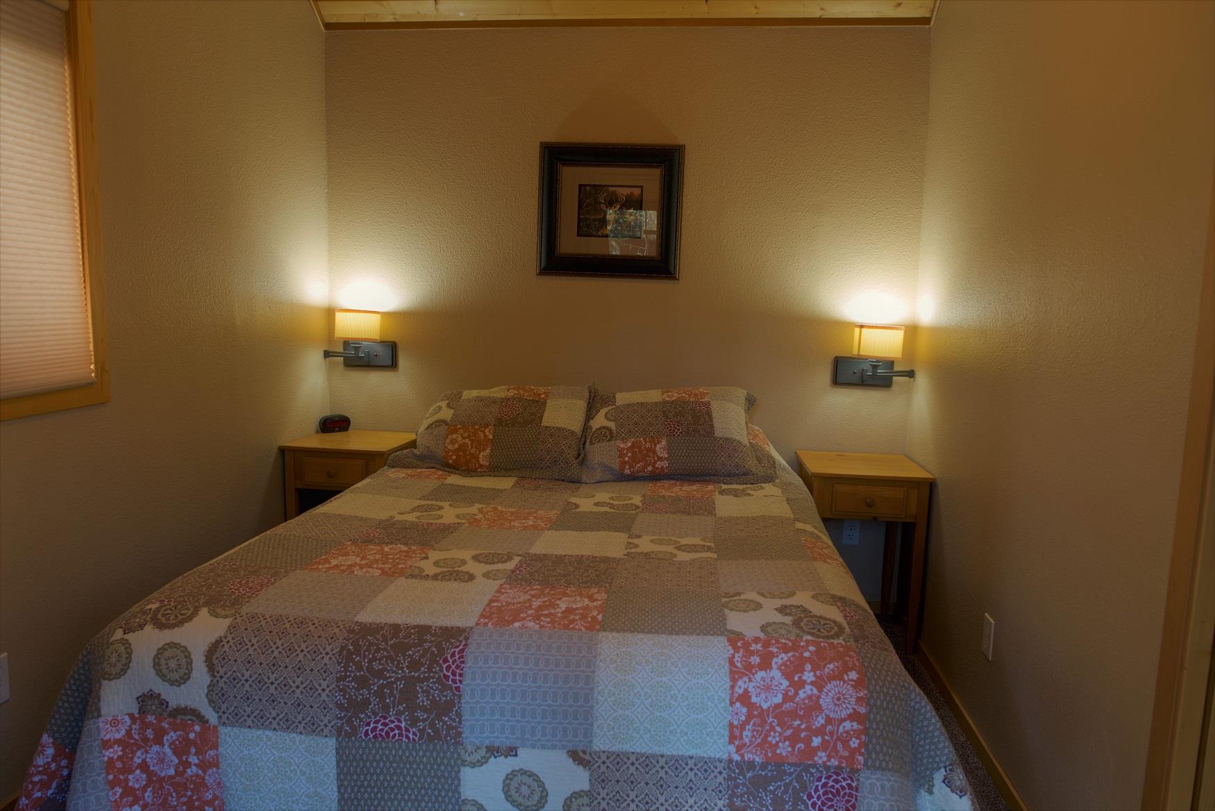 Get your best night sleep in the comfy queen bed in Riverview Cabin, at Cold Springs Resort & RV Park in Camp Sherman, Oregon