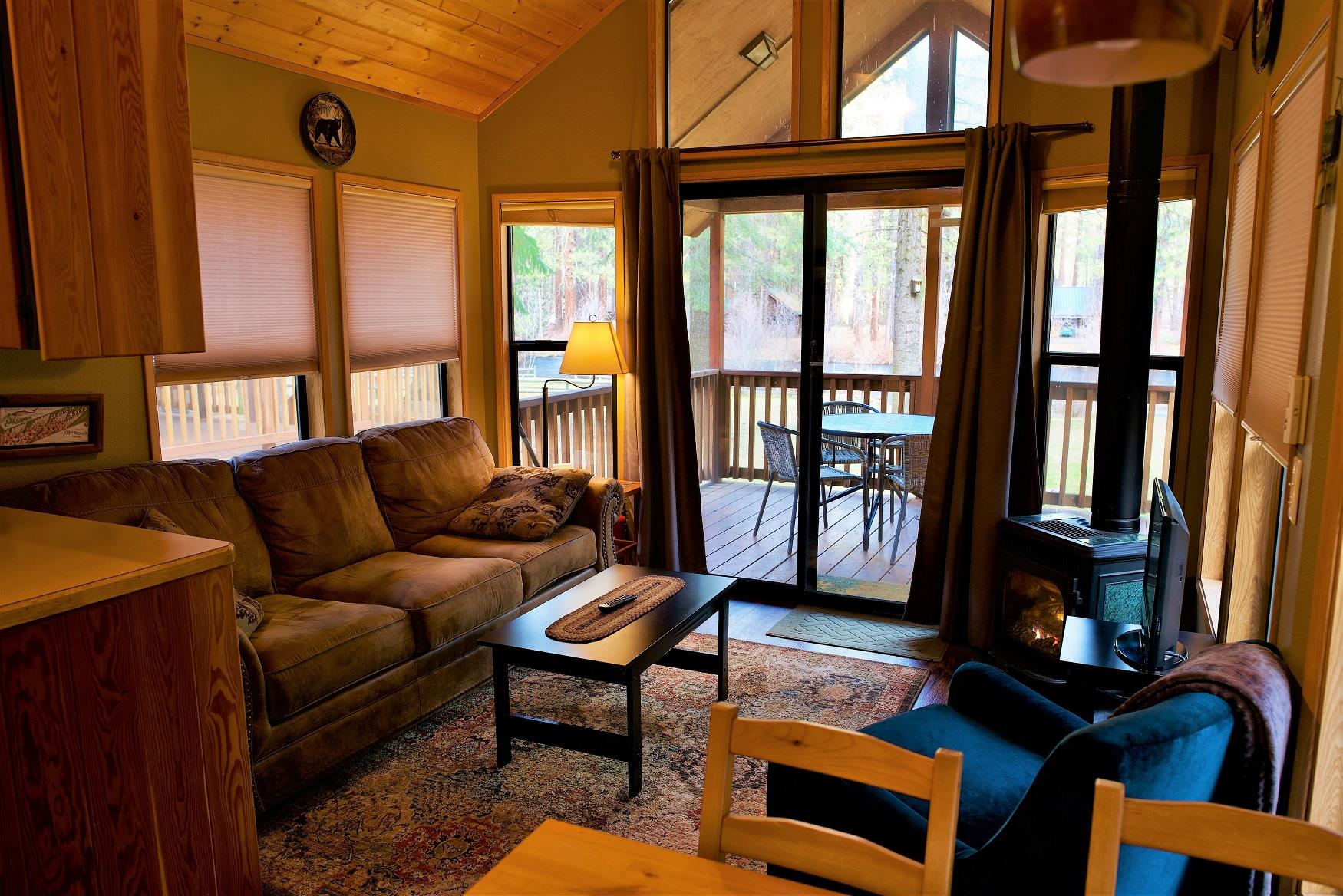The living room of Spruce Cabin at Cold Springs Resort & RV Park in Camp Sherman, Oregon
