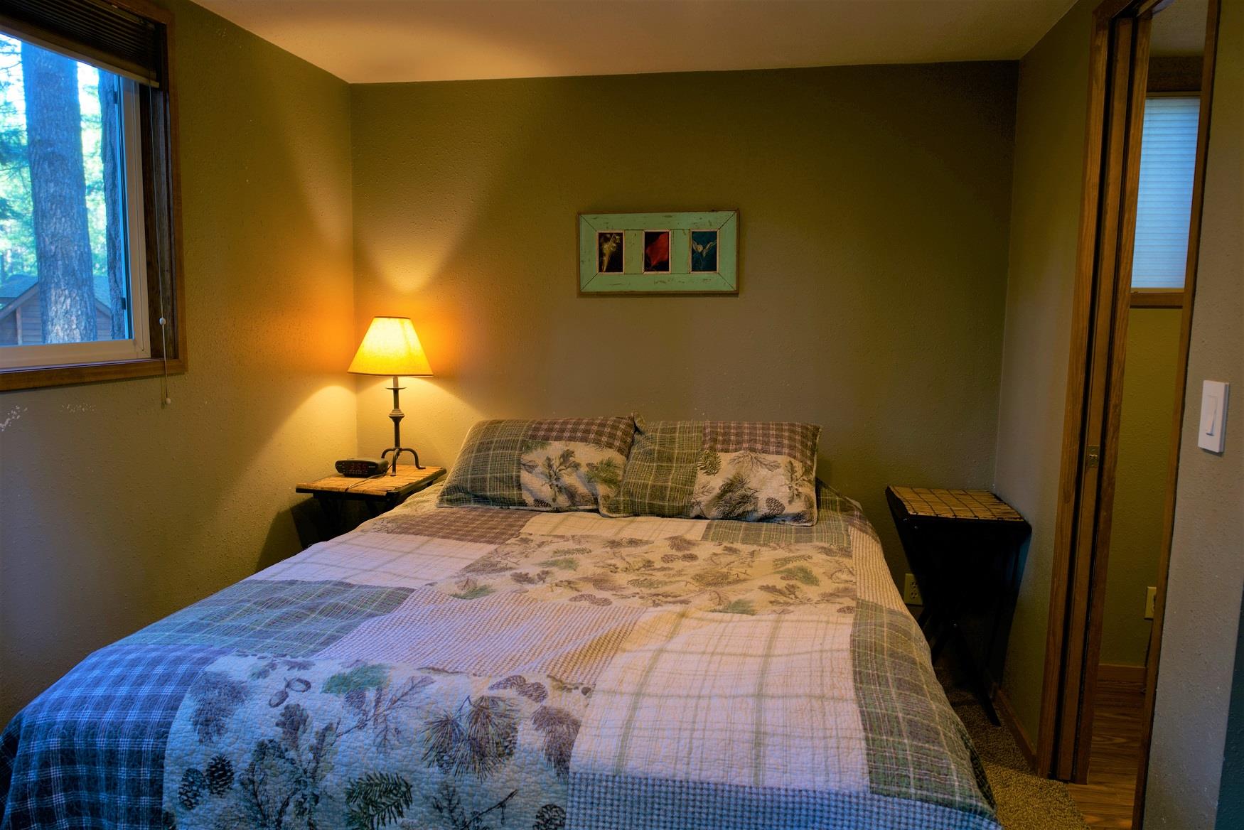 Get your best night sleep in the comfy queen bed in Alder Cabin, at Cold Springs Resort & RV Park in Camp Sherman, Oregon
