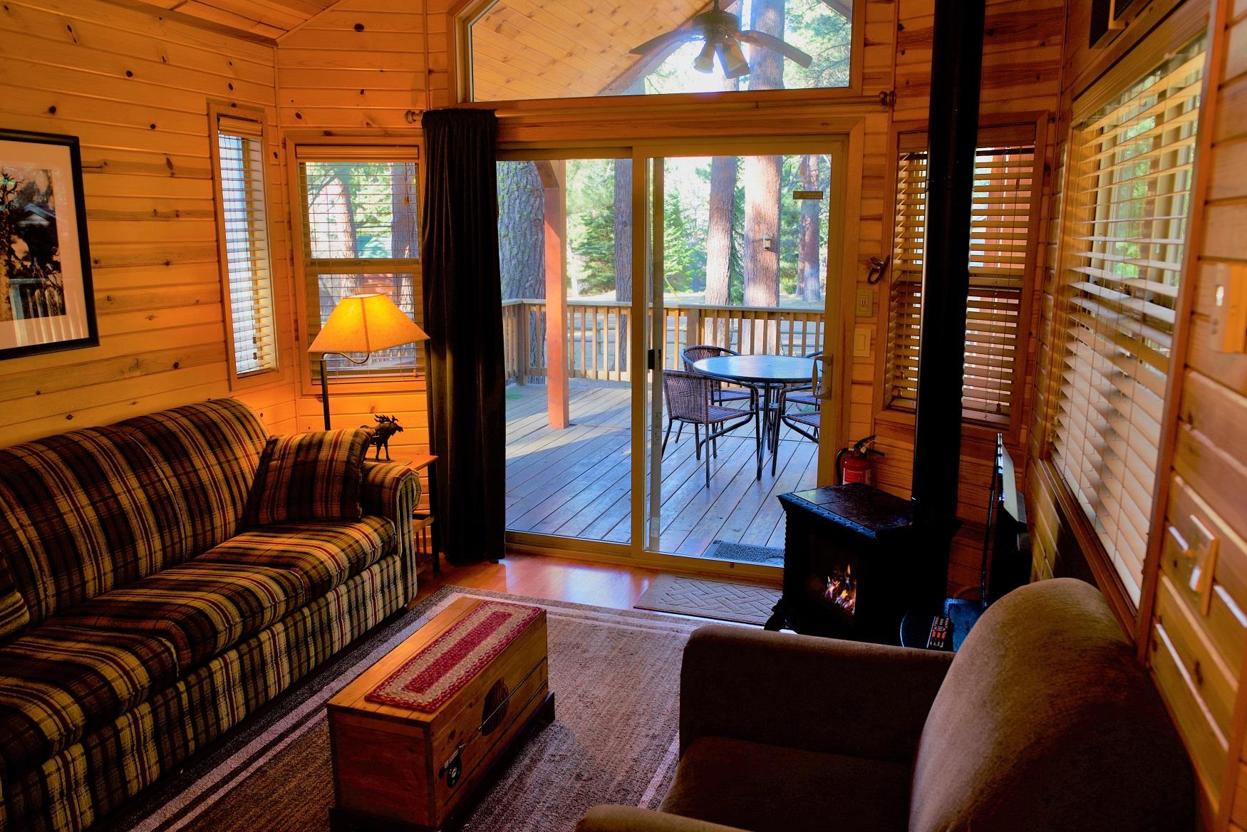 The cozy living room of Larch Cabin at Cold Springs Resort & RV Park in Camp Sherman, Oregon