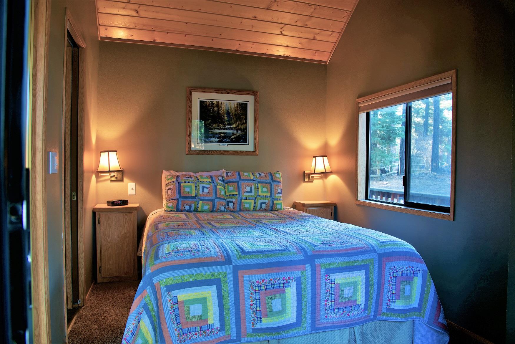 Get your best night sleep in the comfy queen bed in Aspen Cabin, at Cold Springs Resort & RV Park in Camp Sherman, Oregon