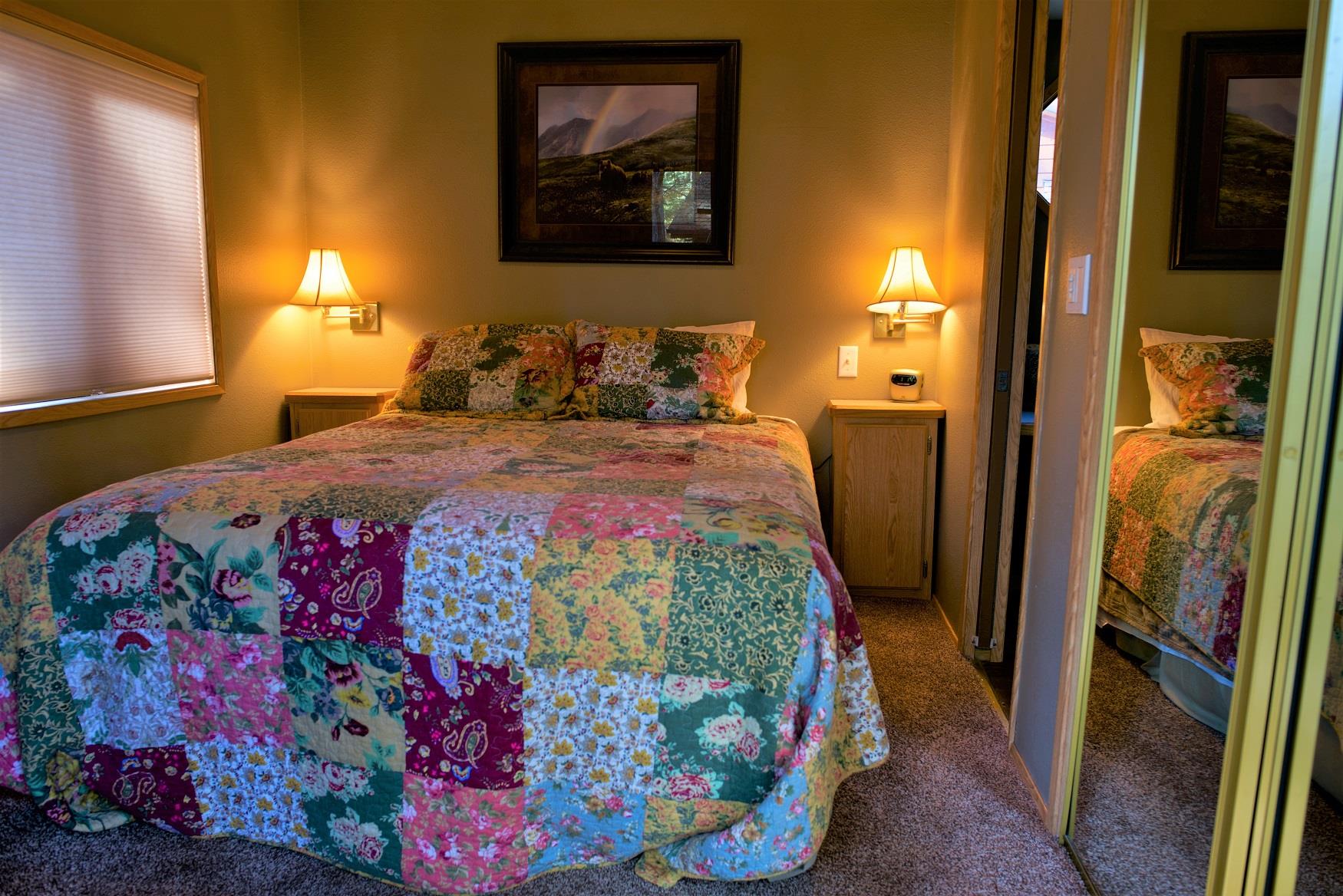 Get your best night sleep in the comfy queen bed in Cedar Cabin, at Cold Springs Resort & RV Park in Camp Sherman, Oregon